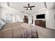 Comfortable bedroom showcasing a tray ceiling, and neutral decor at 169 Aspen Hall Dr, Canton, GA 30115