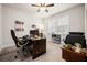 Functional home office with modern desk, ergonomic chair, and ample natural light at 169 Aspen Hall Dr, Canton, GA 30115