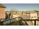 Backyard view from the deck showcasing the neighborhood and lush surroundings at 980 Yancey Ct, Loganville, GA 30052