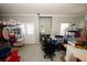 Unfinished basement with ample storage shelves and unfinished ceilings at 980 Yancey Ct, Loganville, GA 30052