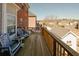 Relaxing deck area with rocking chairs and a view of the backyard, perfect for outdoor lounging at 980 Yancey Ct, Loganville, GA 30052