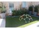 Backyard play area with a geometric climbing structure on lush green turf at 104 Grand Cres, Alpharetta, GA 30009