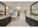 Luxurious bathroom with double vanity sinks, garden tub, and bright natural light at 18 Blackland Nw Rd, Atlanta, GA 30342