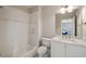 Bathroom features a vanity with a marble countertop, integrated sink, and tiled backsplash at 18 Blackland Nw Rd, Atlanta, GA 30342