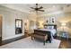 Beautiful bedroom features tray ceilings, a ceiling fan, and elegant decor at 18 Blackland Nw Rd, Atlanta, GA 30342