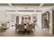 Formal dining room with coffered ceiling, chandelier, and large windows at 18 Blackland Nw Rd, Atlanta, GA 30342