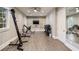 Well-equipped home gym featuring modern exercise machines and storage solutions at 18 Blackland Nw Rd, Atlanta, GA 30342