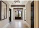 Bright hallway with wood-paneled walls, hardwood floors, and modern lighting fixtures at 18 Blackland Nw Rd, Atlanta, GA 30342