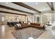 Open concept living room view of the kitchen with white trim and wood beam ceilings at 18 Blackland Nw Rd, Atlanta, GA 30342