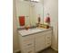 Bathroom featuring a white vanity with gray countertop, bronze fixtures, and a large mirror at 25108 Plantation Dr # 108, Atlanta, GA 30324