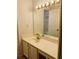 Bathroom view with a large mirror above a white sink and vanity at 25108 Plantation Dr # 108, Atlanta, GA 30324