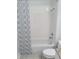 Bright bathroom features a shower and tub with a decorative curtain at 384 Ralph Mcgill Ne Blvd # 121, Atlanta, GA 30312