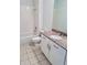 Bathroom featuring granite counters, tile floors and tub with shower at 384 Ralph Mcgill Ne Blvd # 121, Atlanta, GA 30312