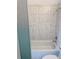 Clean bathroom featuring tiled walls and a shower and tub combination at 384 Ralph Mcgill Ne Blvd # 121, Atlanta, GA 30312