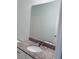 Bright bathroom featuring granite counters and large mirror at 384 Ralph Mcgill Ne Blvd # 121, Atlanta, GA 30312