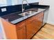 Kitchen with a large stainless steel sink and wooden cabinets at 384 Ralph Mcgill Ne Blvd # 121, Atlanta, GA 30312