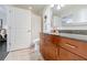 Bright bathroom featuring granite countertop, with a toilet and full shower-tub combo at 44 Peachtree Ne Pl # 829, Atlanta, GA 30309