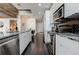 Modern kitchen with stainless steel appliances, granite countertops, and modern backsplash at 44 Peachtree Nw Pl # 829, Atlanta, GA 30309