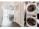 Convenient laundry area with stacked washer and dryer units at 44 Peachtree Nw Pl # 829, Atlanta, GA 30309