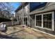 Exterior of two-story home featuring backyard deck, gray siding and green roof at 452 Springfield Dr, Woodstock, GA 30188