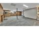 Large basement with finished flooring and ample space for storage at 239 Holloway Dr, Canton, GA 30115