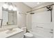Cozy bathroom featuring a vanity with mirror, tub with shower, and a toilet at 543 Harbor Lake Ct, Marietta, GA 30066