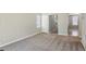 Spacious carpeted room featuring neutral paint and bright window with blinds at 543 Harbor Lake Ct, Marietta, GA 30066