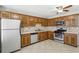 Kitchen with stainless steel appliances, tile backsplash, and ample countertop space at 543 Harbor Lake Ct, Marietta, GA 30066