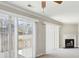 Living room features a fireplace, sliding doors to the exterior, and neutral paint at 543 Harbor Lake Ct, Marietta, GA 30066