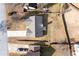 A high angle view of a single-Gathering home with driveway and fenced backyard at 6800 Bells Landing Way, Rex, GA 30273