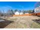 Large backyard featuring a wood fence at 6800 Bells Landing Way, Rex, GA 30273