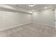 View of the finished basement featuring neutral carpet, white walls, and recessed lighting at 1929 Quarry Park Nw Pl, Atlanta, GA 30318