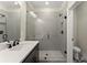 Elegant bathroom showcasing sleek fixtures, a tiled shower, and a modern design at 1929 Quarry Park Nw Pl, Atlanta, GA 30318