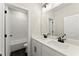 Bathroom featuring a double vanity, modern fixtures, and a tiled shower/tub combination at 1929 Quarry Park Nw Pl, Atlanta, GA 30318