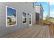 Exterior view of the spacious wooden deck, offering a private and serene outdoor space at 1929 Quarry Park Nw Pl, Atlanta, GA 30318