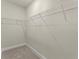 Walk-in closet providing ample storage space with wire shelving at 1929 Quarry Park Nw Pl, Atlanta, GA 30318