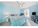 Bedroom featuring blue walls, carpeted floors, fan, and lots of natural light at 330 Cottonwood Creek Cir, Canton, GA 30114