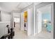Upstairs hallway featuring neutral walls, carpet, and a laundry closet at 330 Cottonwood Creek Cir, Canton, GA 30114