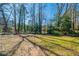 Large backyard features lush lawn and mature trees at 4023 Snapfinger Way, Decatur, GA 30035