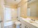 Bathroom with white tile walls and fixtures, perfect for renovation at 4023 Snapfinger Way, Decatur, GA 30035