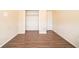 Bedroom with closet and wood-look flooring at 4023 Snapfinger Way, Decatur, GA 30035