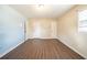 Spacious bedroom featuring hardwood floors and two closets at 4023 Snapfinger Way, Decatur, GA 30035