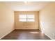 Bedroom featuring wood-look flooring and a double window at 4023 Snapfinger Way, Decatur, GA 30035