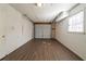 Garage space with window for natural light and interior access door at 4023 Snapfinger Way, Decatur, GA 30035