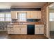 Galley kitchen with updated cabinets and a double sink at 4023 Snapfinger Way, Decatur, GA 30035