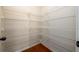 Walk-in pantry with multiple wire shelves, providing ample storage space in the kitchen at 103 Magnaview Dr, Mcdonough, GA 30253