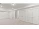 Basement featuring two double closets, offering generous storage at 1937 Quarry Park Nw Pl, Atlanta, GA 30318