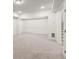Spacious basement area with neutral carpet, offering flexible living or storage space at 1937 Quarry Park Nw Pl, Atlanta, GA 30318