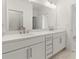 Bathroom featuring double sinks, stylish fixtures, and vanity with white countertop at 1937 Quarry Park Nw Pl, Atlanta, GA 30318
