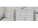 Clean bathroom with a white vanity, gold fixtures, and modern sink at 1937 Quarry Park Nw Pl, Atlanta, GA 30318